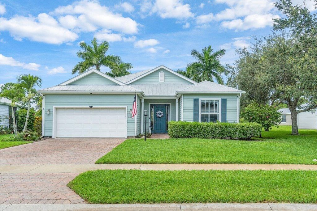 Photo of 450 NE Canoe Park Circle, Port St Lucie, FL 34983 (MLS # R10907407)