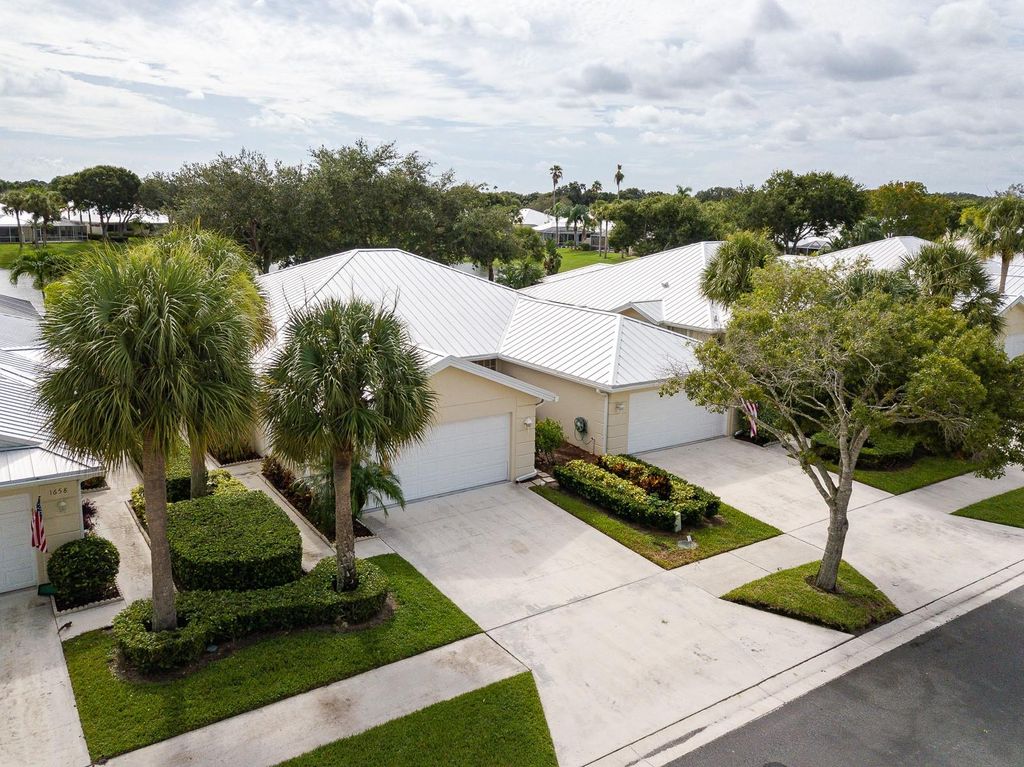 Photo of 1654 SW Waterfall Blvd, Palm City, FL 34990 (MLS # F10523682)