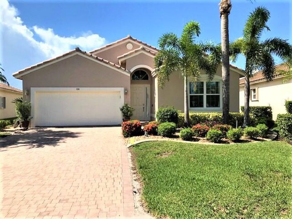 Photo of 314 NW Shoreline Circle Cir, Port Saint Lucie, FL 34986 (MLS # R10819752)