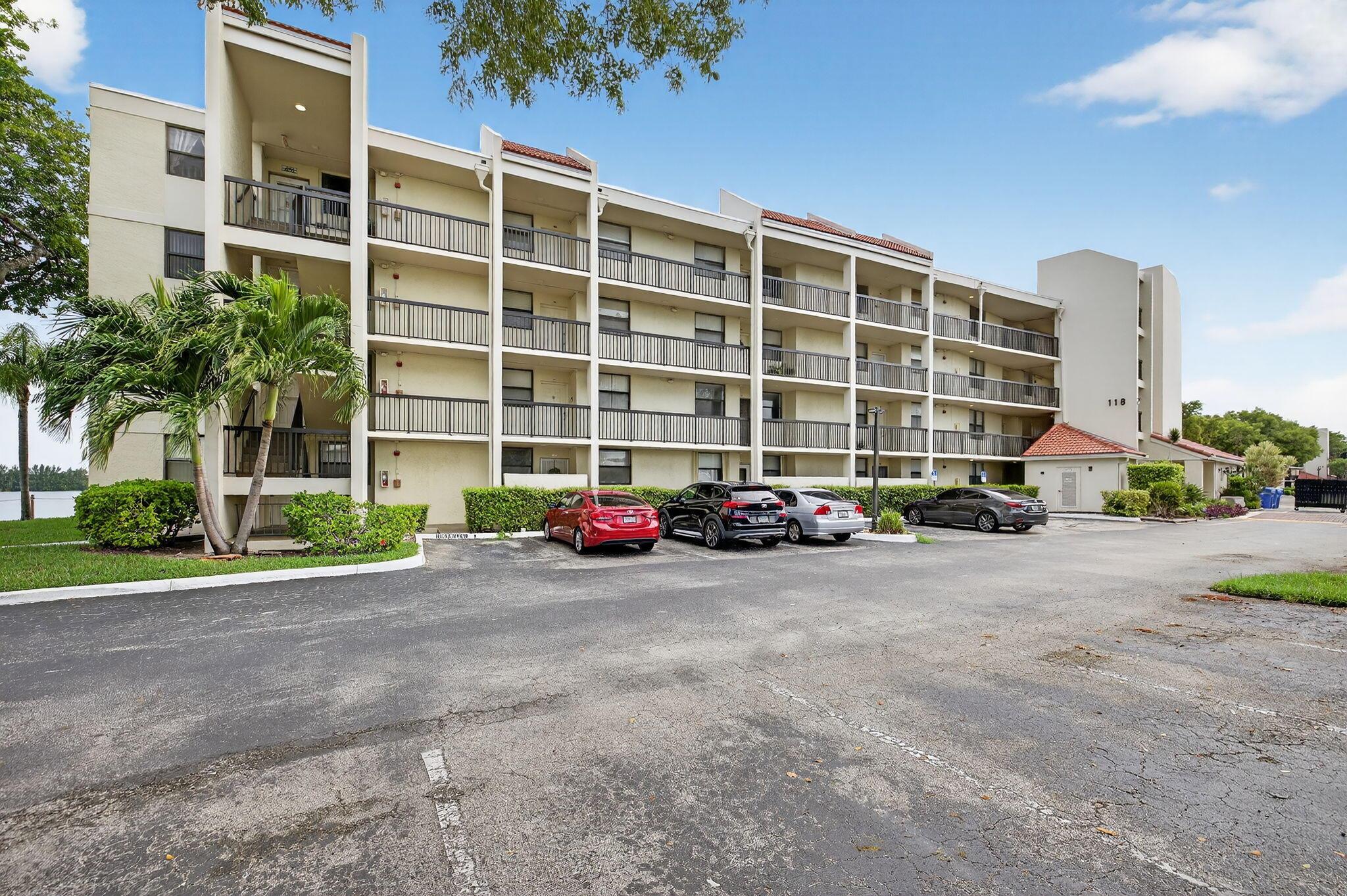 LOCATION, LOCATION, LOCATION! Most private building nestled at the edge of the community. All inspections, restoration, roof, and paint has been redone.1st floor condo next to the corner unit. Direct walk-out access to the largest lake in Broward county with a path to walk around yourself or with your pets. Beautifully remodeled kitchen and bathrooms offering perfect views of the lake from primary bedroom, living room and your private covered patio. A heated pool and hot tub are only a short walk away. Newer appliances, counter tops, and modern white cabinets. Tile and luxury vinyl plank flooring in bedrooms. Laundry inside! Resort style living, fun amenities, with 3 separate pool areas, a clubhouse, tennis courts, and boating right where you live. Close to schools and shopping!