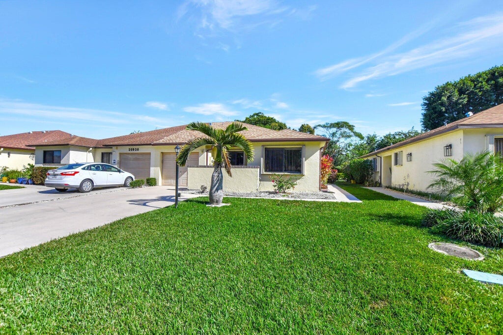 Photo of 20936 E CONCORD GREEN Drive E, Boca Raton, FL 33433 (MLS # B26053921)