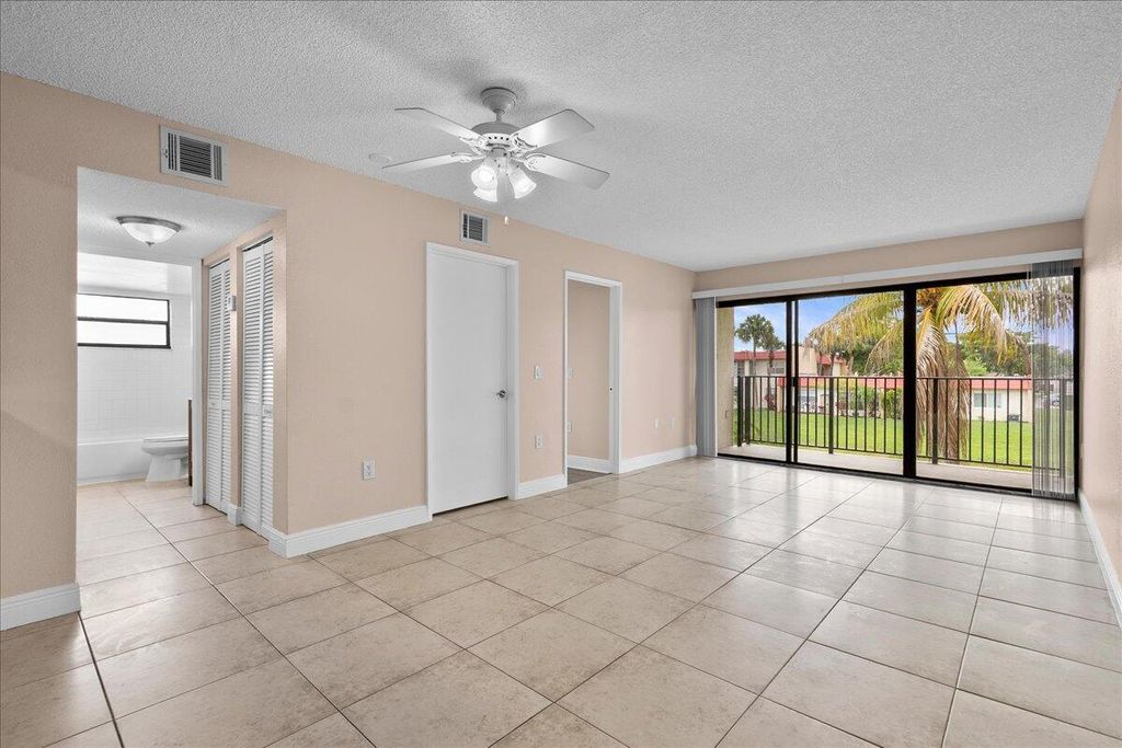 Photo of 1524 Lake Crystal Drive #F, Royal Palm Beach, FL 33411 (MLS # B26037100)