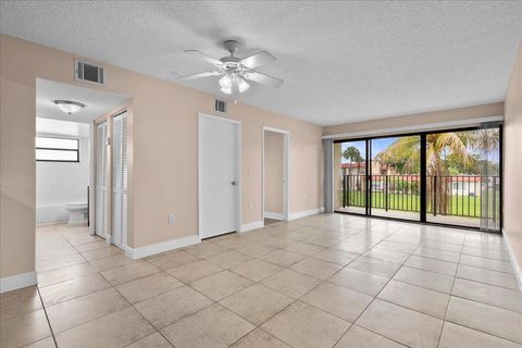 Photo of 1524 Lake Crystal Drive #F, Royal Palm Beach, FL 33411 (MLS # B26037100)