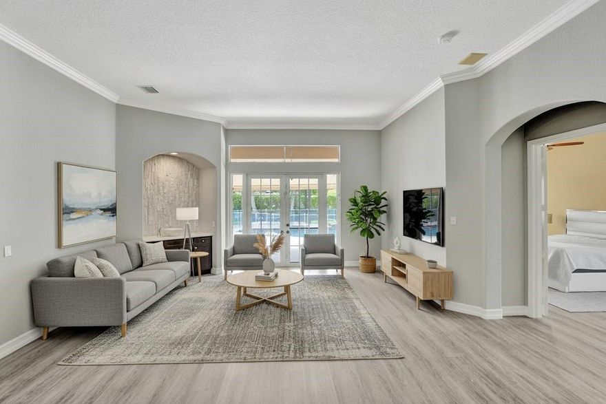 Enjoy Coral Springs value with access to Parkland’s A-rated schools and a low HOA, perfect for families seeking space, comfort, and convenience. This 5-bed, 3-bath home sits on a large oversized lot and offers a smart split layout: the private primary suite sits in its own wing with an adjacent flex room, ideal as a nursery or office (room 5). A guest room and bath tucked behind the family room, and 2 bedrooms share a bath in their own zone. The open living areas flow into a beautiful, inviting kitchen with a smart fridge & decorative fireplace in the family room, ideal for daily life and entertaining. Plantation shutters throughout. Enjoy a pool, pergola & built-in BBQ. The 3-car garage with AC add flexibility for storage, workouts, or hobbies. Close to top schools, shops, and parks.