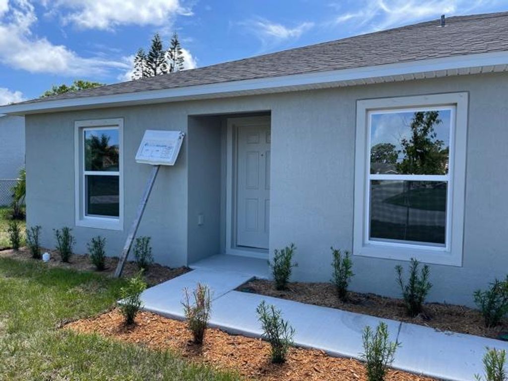 Photo of 2494 SE University Terrace, Port Saint Lucie, FL 34952 (MLS # R10722787)