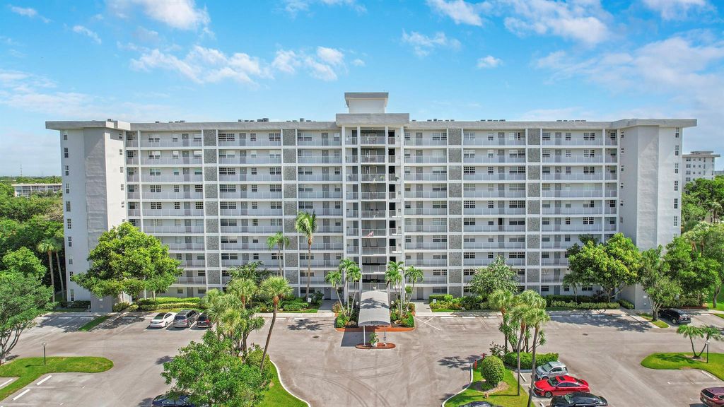 Photo of 4015 W Palm Aire Drive #704, Pompano Beach, FL 33069 (MLS # R11091497)