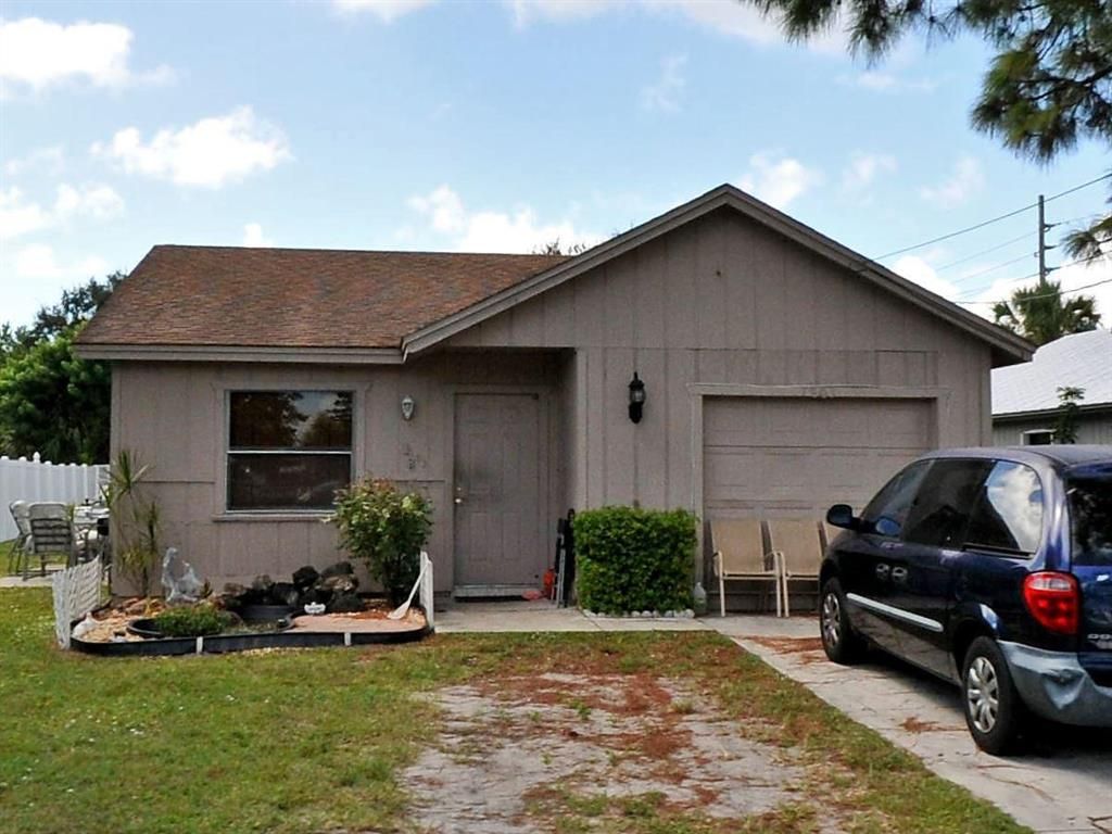 Photo of 1803 S 27th S Street, Fort Pierce, FL 34947 (MLS # R10718954)