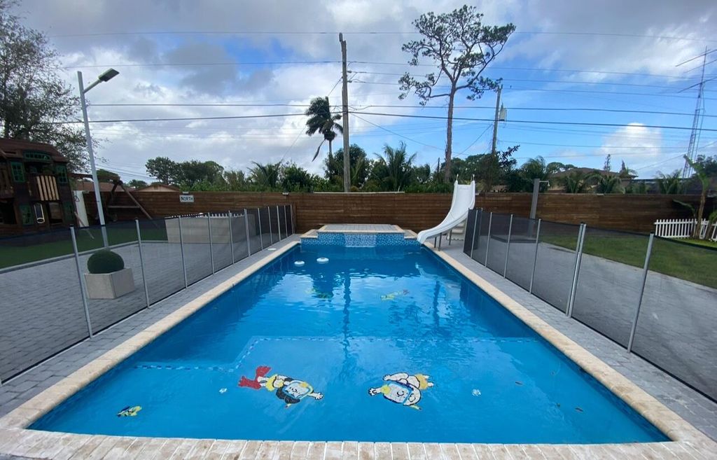 Photo of 15276 Harrison Road, Delray Beach, FL 33484 (MLS # B26034562)