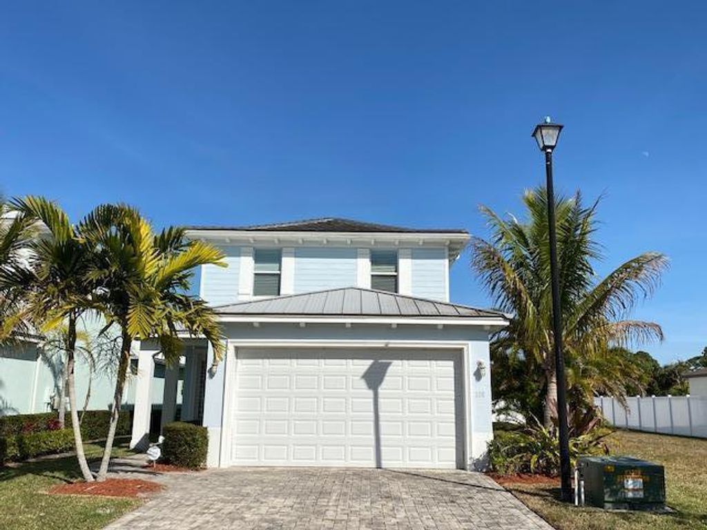 Photo of 108 SE Via Visconti, Port Saint Lucie, FL 34952 (MLS # R10679392)