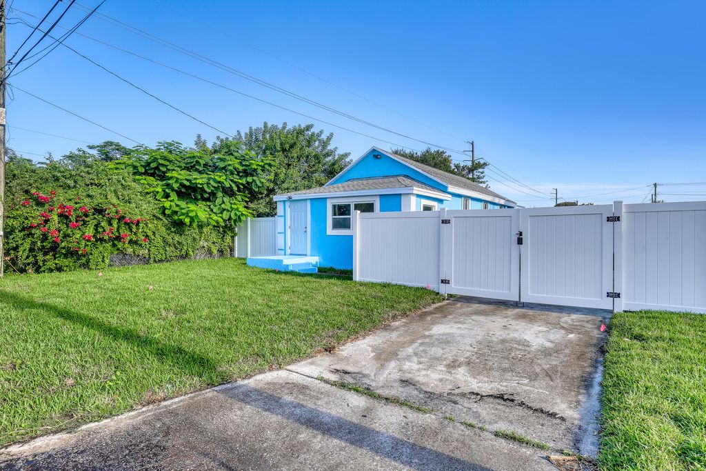Photo of 180 W 15th St, Riviera Beach, FL 33404 (MLS # R11161965)