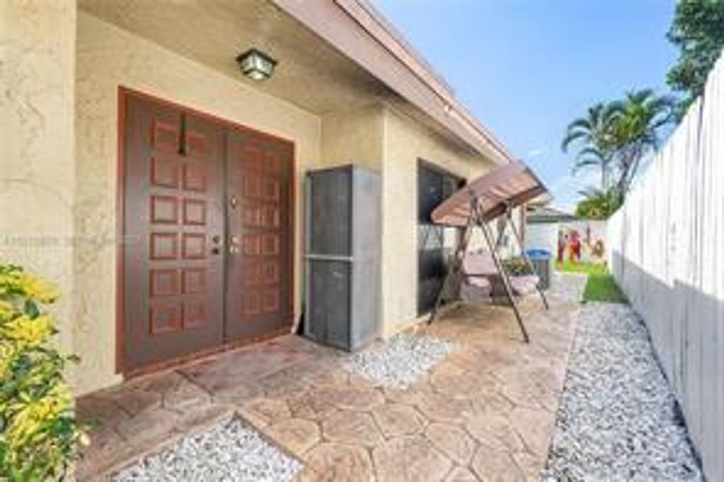 Photo of 7433 SW 13TH Street SW, North Lauderdale, FL 33068 (MLS # B26056721)
