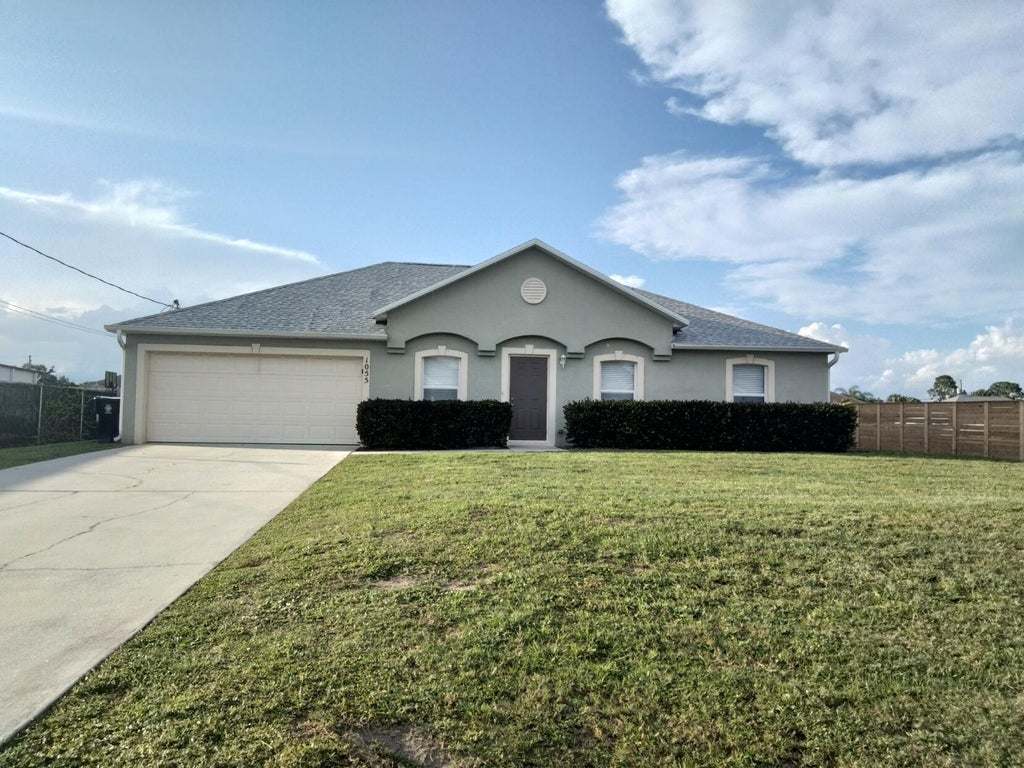 Photo of 1055 SW Idol Avenue, Port St Lucie, FL 34953 (MLS # R10896675)