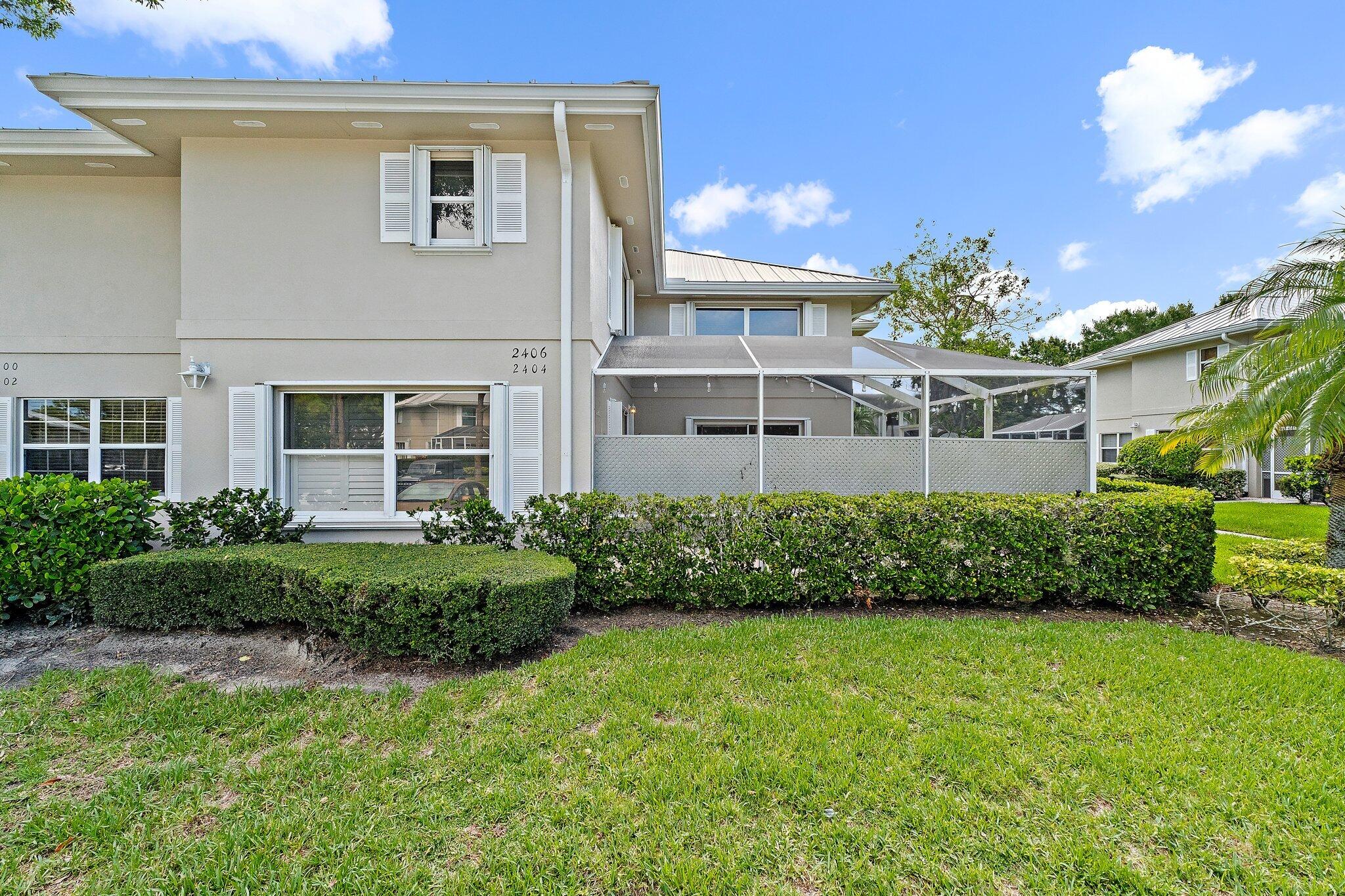 Welcome to 2406 SW Danbury Lane, a charming 2-bedroom, 2.5-bath townhouse located in The Meadows, a secure gated community in the heart of Palm City. This annual rental features a beautifully updated kitchen, stylish wallpaper accents, accordion hurricane shutters, and an in-unit washer and dryer for added convenience. Both bedrooms offer en-suite bathrooms, with a half-bath on the main floor. Enjoy private outdoor space and amenities including a community pool, tennis courts, clubhouse, and 24-hour guard-gated security. Pet-friendly with restrictions and a non-refundable deposit. Available now--schedule your showing today!