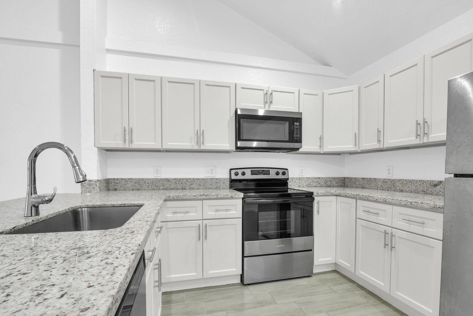 Large 4 Bedroom, 2 Bath Townhouse in Wellington! Living room has high vaulted ceilings and recently updated Kitchen cabinets. All stainless steel appliances! Primary Bedroom includes a walk in closet and home also includes an in unit Washer, Dryer. 2 assigned parking spaces. Apply now before its gone! Tenant must also enroll in our resident benefit package at $64.50/ month which includes HVAC filters, credit reporting of rent, identity theft protection, renters insurance.