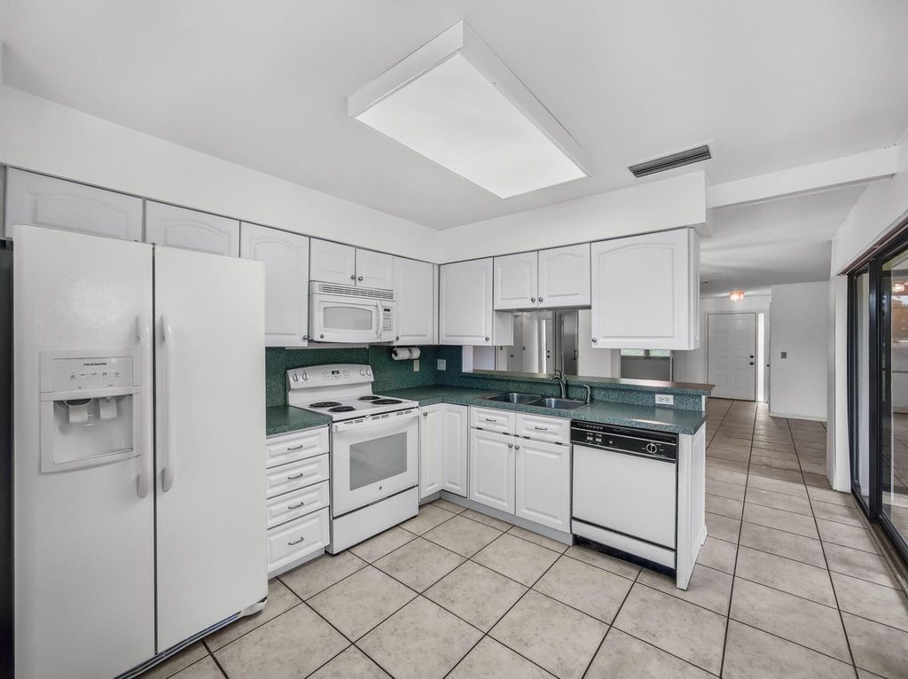 Photo of 3961 SW Greenwood Way #D, Palm City, FL 34990 (MLS # R11095284)