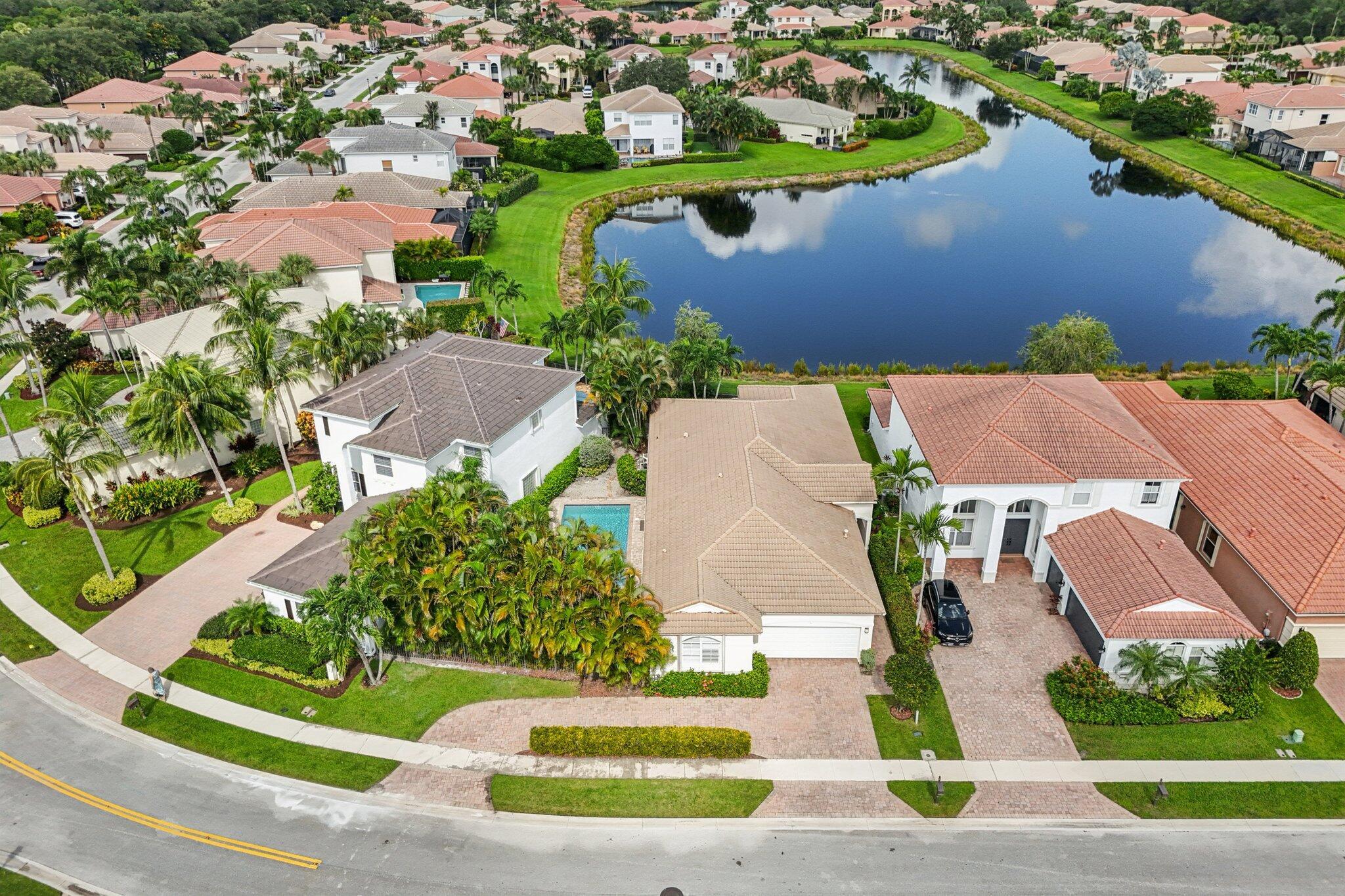 *Resurfaced Pool (2025) *Carrier AC (2025) *Generac Whole-House Generator (2022) *Water Heater (2024) *TWO Fully Fenced Outdoor Living Spaces *Expanded Circular Driveway*Lake Views *Smoothed Walls *LVT, Wood & Tile Flooring *Stainless Steel Appliances *Natural Gas Cooktop *Reverse Osmosis System *Accordion Shutters*2,579 Sq Ft Single-Story Residence