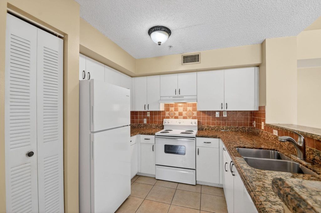 Photo of 7864 Sonoma Springs Circle #206, Lake Worth, FL 33463 (MLS # B26016584)