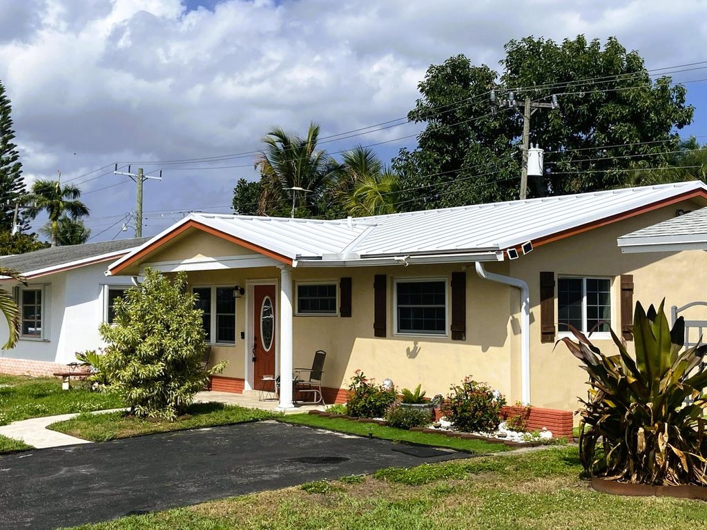 Photo of 4570 NW 16th Avenue, Tamarac, FL 33309 (MLS # B26003846)