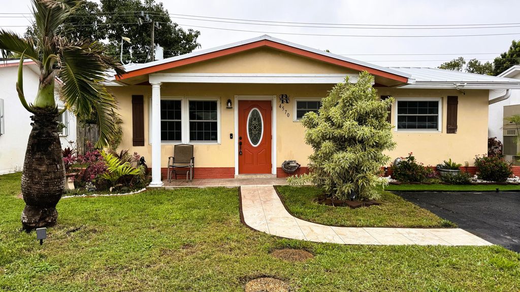 Photo of 4570 NW 16th Avenue, Tamarac, FL 33309 (MLS # B26003846)