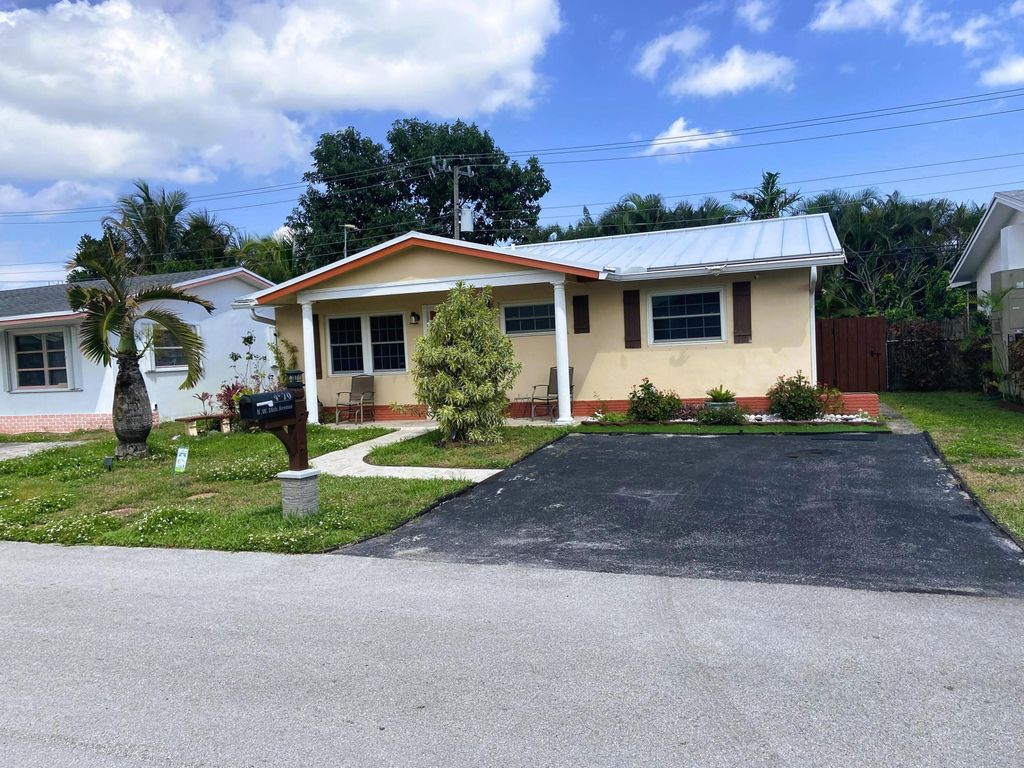 Photo of 4570 NW 16th Avenue, Tamarac, FL 33309 (MLS # B26003846)