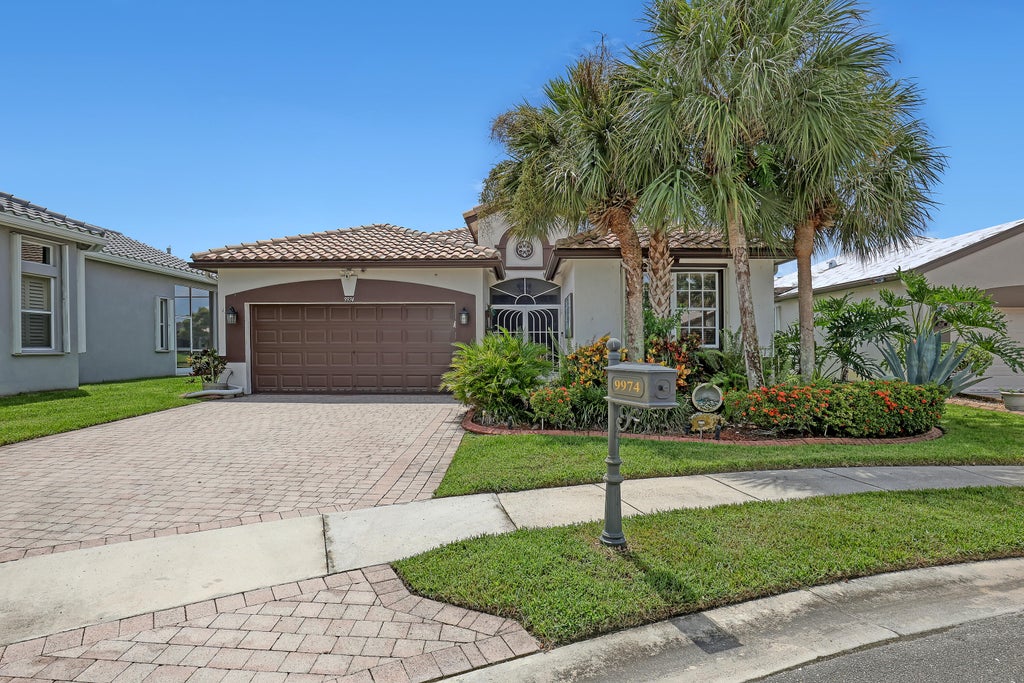 Photo of 9974 Mantova Drive, Lake Worth, FL 33467 (MLS # B26077115)