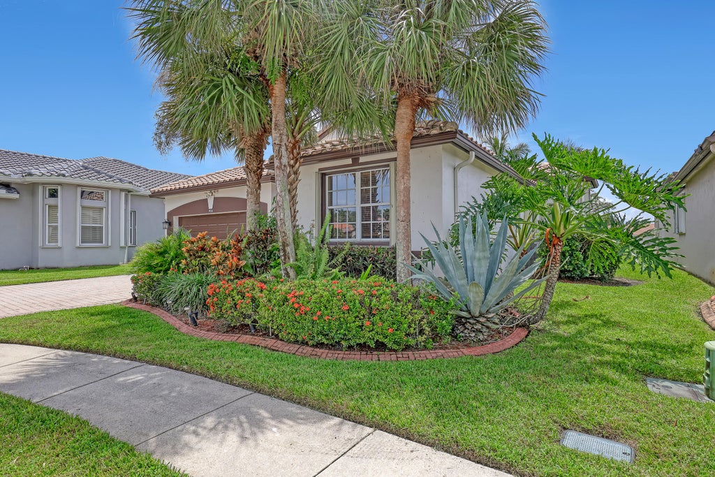 Photo of 9974 Mantova Drive, Lake Worth, FL 33467 (MLS # B26077115)
