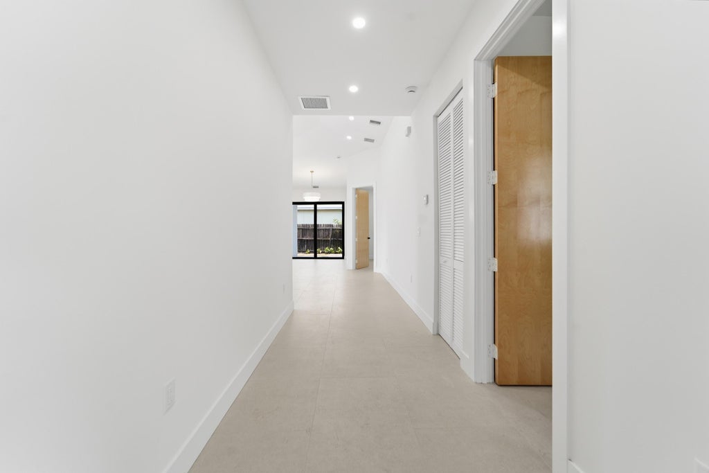 Photo of 710 Talladega Street, West Palm Beach, FL 33405 (MLS # B26043343)