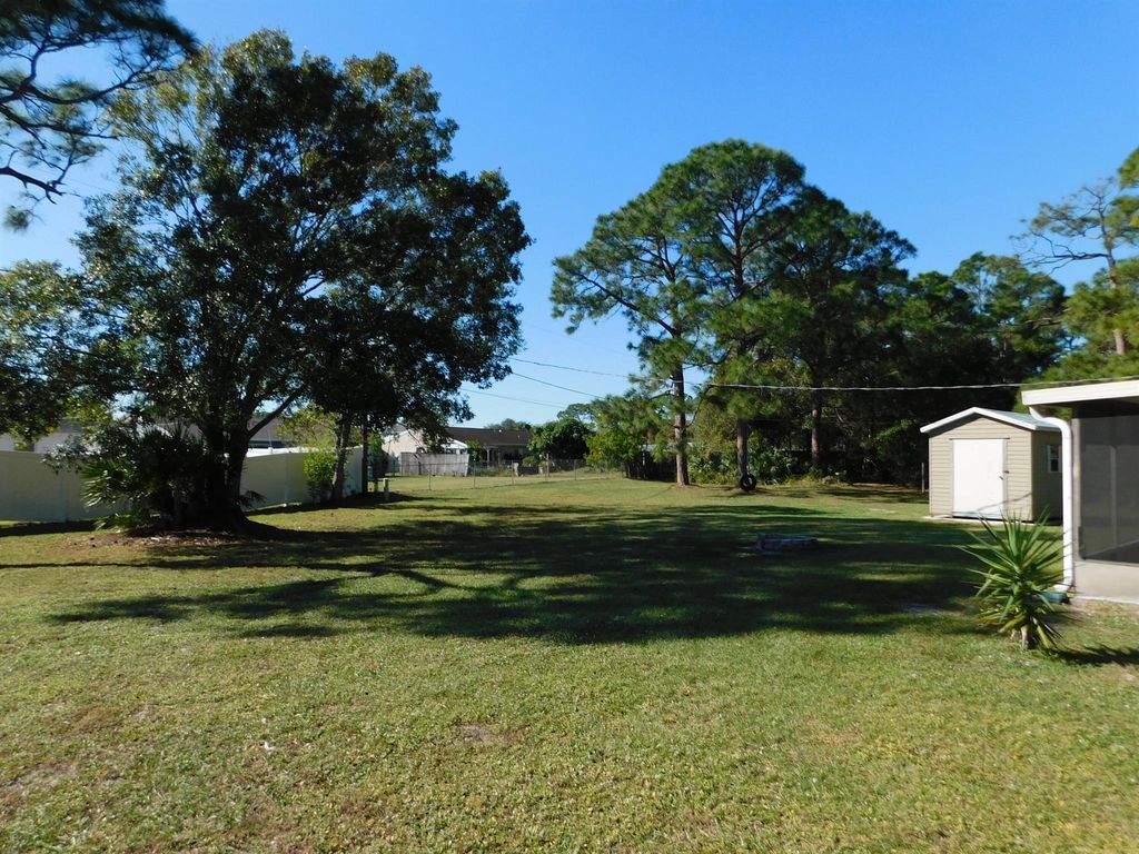 Photo of 166 SW Lancaster Avenue, Port Saint Lucie, FL 34984 (MLS # R11044330)