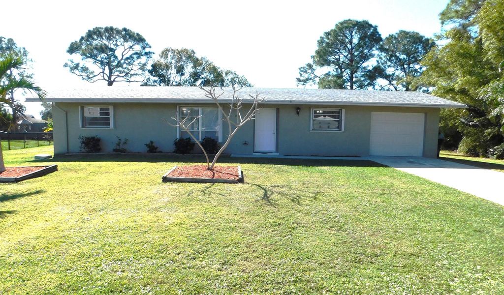 Photo of 166 SW Lancaster Avenue, Port Saint Lucie, FL 34984 (MLS # R11044330)