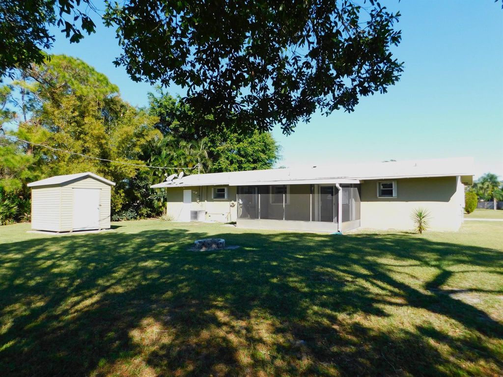 Photo of 166 SW Lancaster Avenue, Port Saint Lucie, FL 34984 (MLS # R11044330)