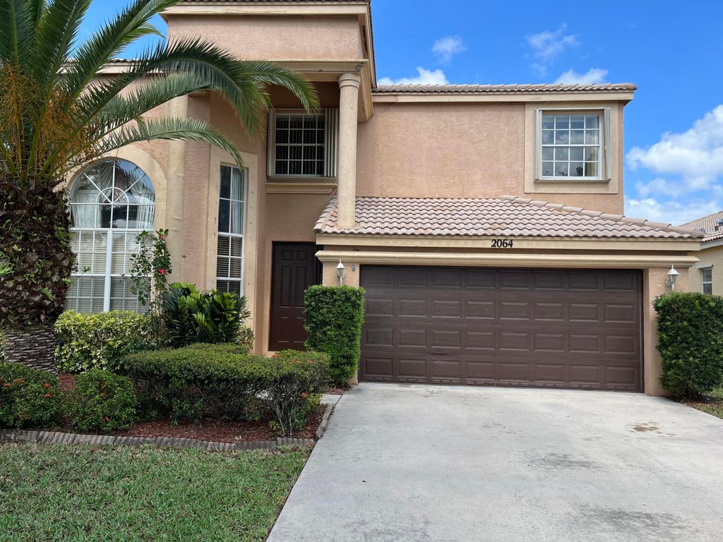 Photo of 2064 Reston Circle, Royal Palm Beach, FL 33411 (MLS # B26036649)