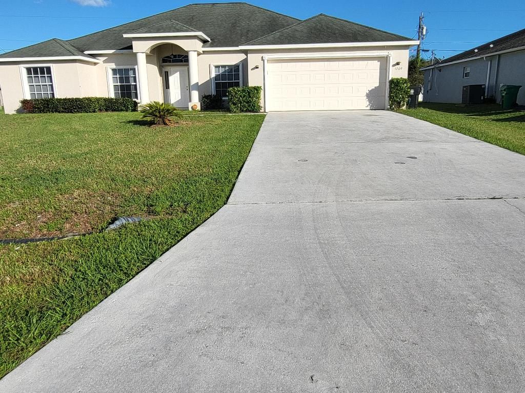Photo of 4209 SW Whitebread Road, Port Saint Lucie, FL 34953 (MLS # R11133637)