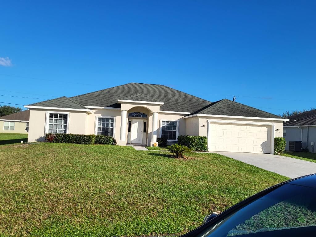 Photo of 4209 SW Whitebread Road, Port Saint Lucie, FL 34953 (MLS # R11133637)