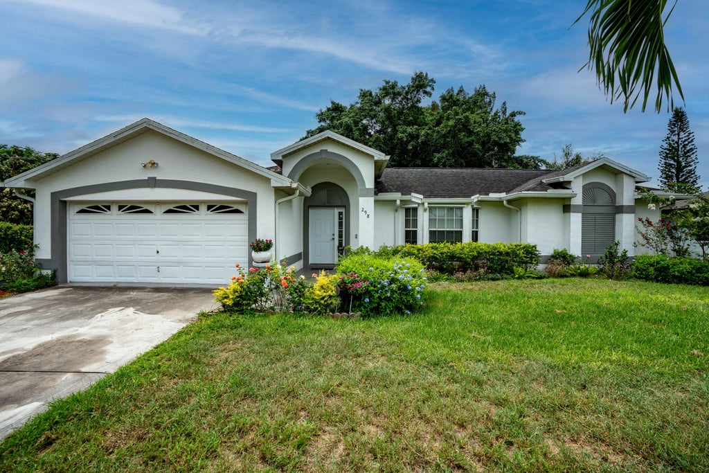 Photo of 298 SW Eyerly Avenue, Port Saint Lucie, FL 34983 (MLS # R11003827)