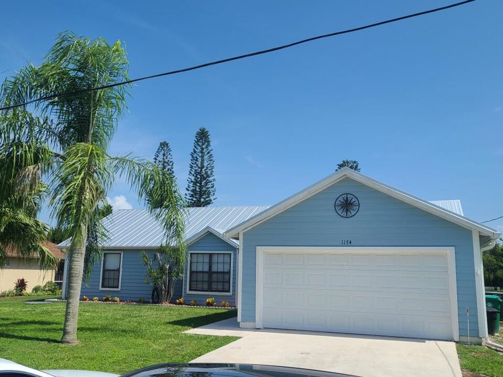 Photo of 1174 SE Petunia Avenue, Port St Lucie, FL 34952 (MLS # R10906575)