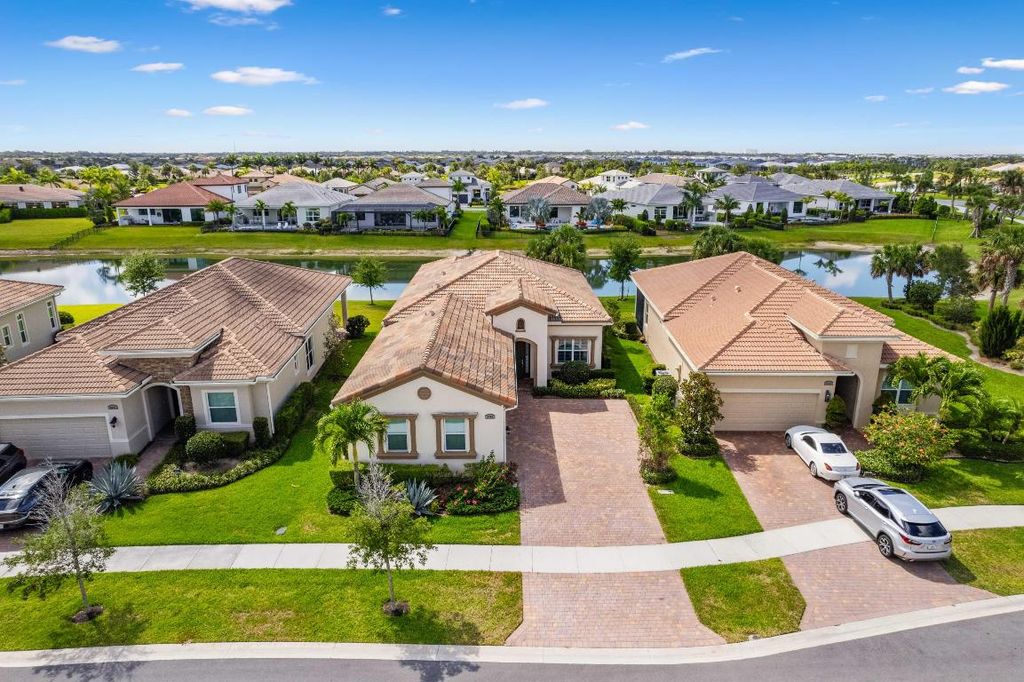 Photo of 8701 SW Carrara Way, Port Saint Lucie, FL 34987 (MLS # R10989906)