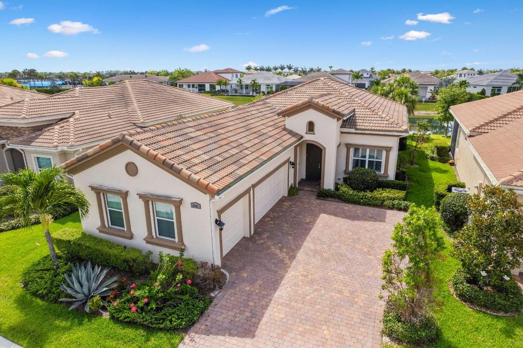 Photo of 8701 SW Carrara Way, Port Saint Lucie, FL 34987 (MLS # R10989906)