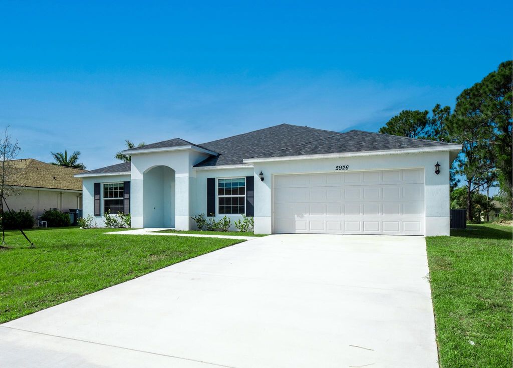 Photo of 5926 NW Batchelor Terrace, Port St Lucie, FL 34986 (MLS # R10893931)