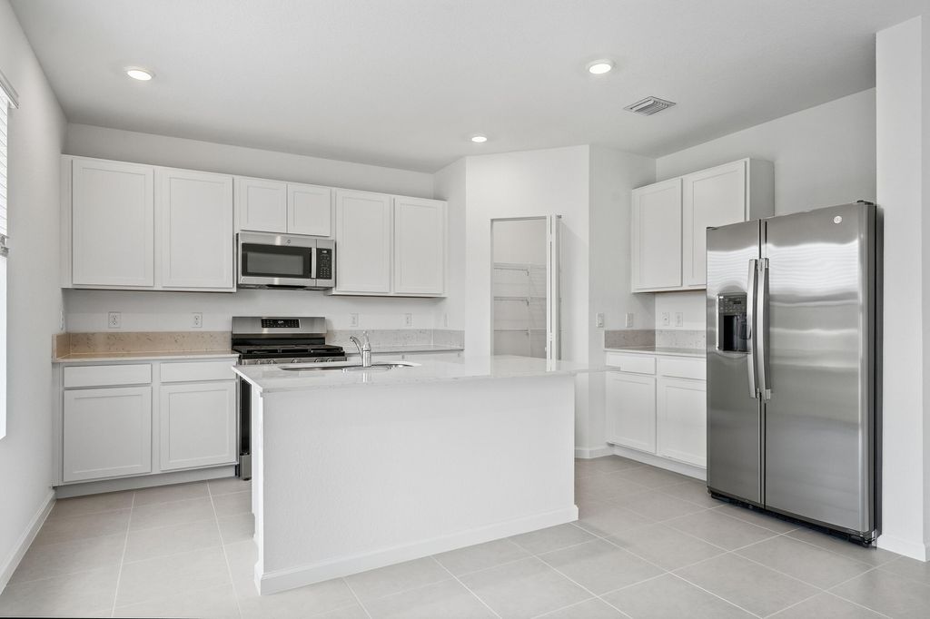 Photo of 10485 NW Suncrest Loop, Port Saint Lucie, FL 34987 (MLS # R11166932)