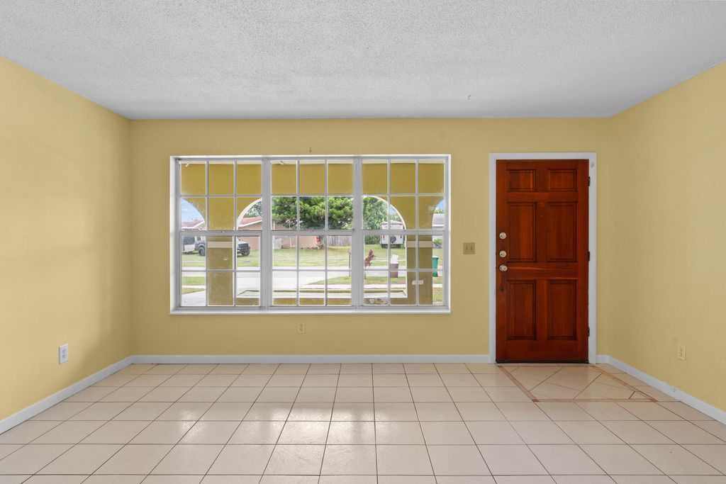 Photo of 821 SE Solaz Avenue, Port Saint Lucie, FL 34983 (MLS # R11148272)