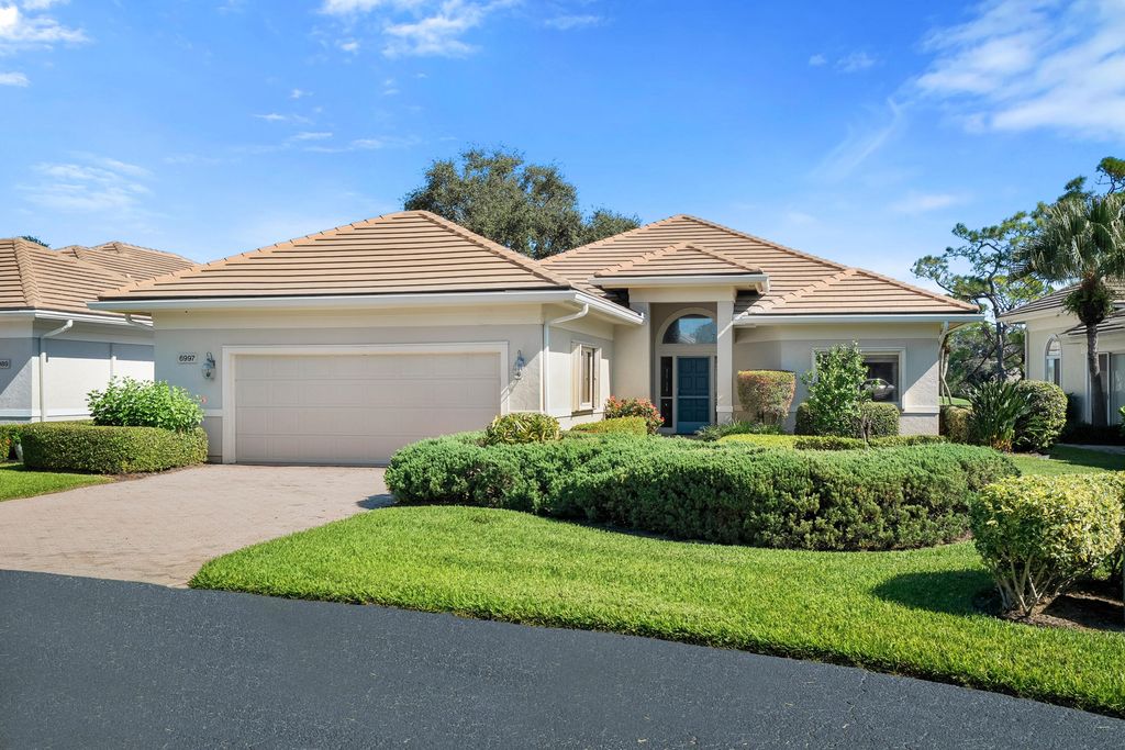 Photo of 6997 SE Pacific Drive, Stuart, FL 34997 (MLS # R11136166)