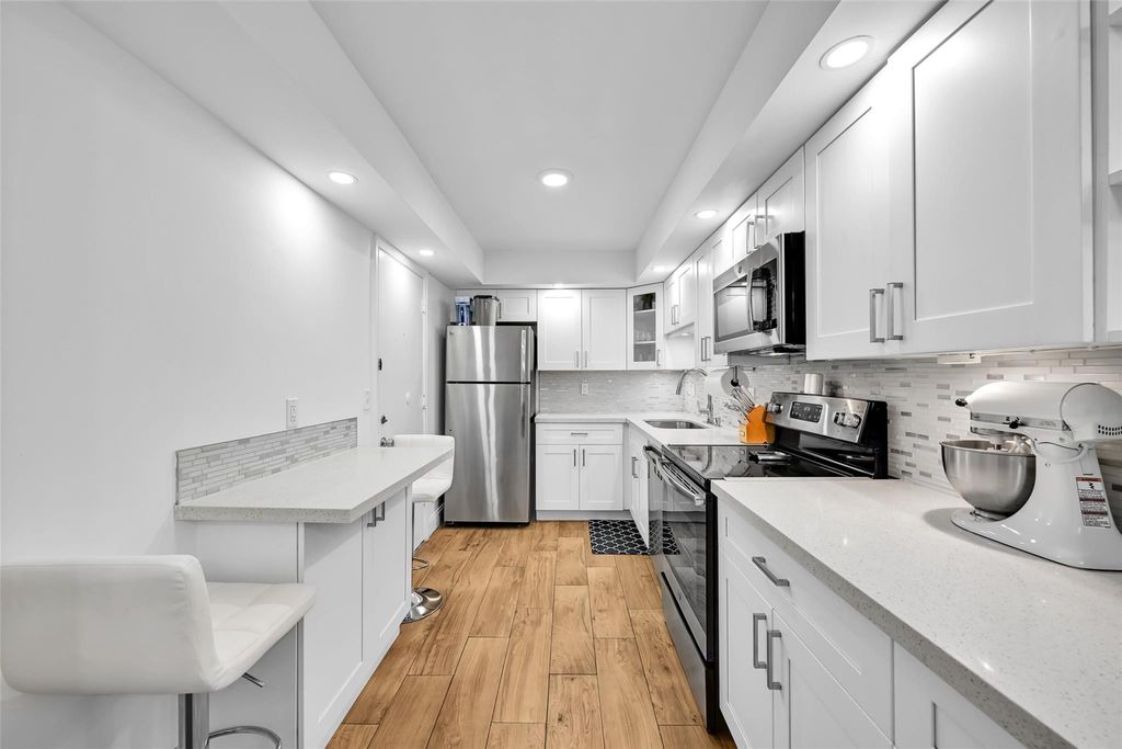 Photo of 1428 SE 4th Avenue #I-167, Deerfield Beach, FL 33441 (MLS # F10534067)