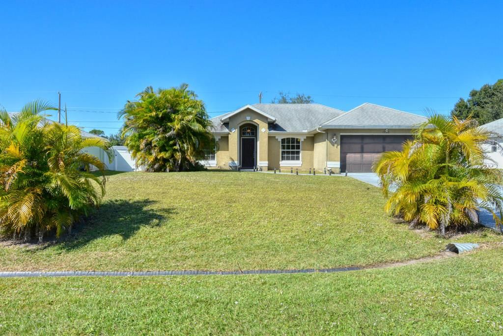 Photo of 1930 SW Glenco Street, Port Saint Lucie, FL 34953 (MLS # R10757115)