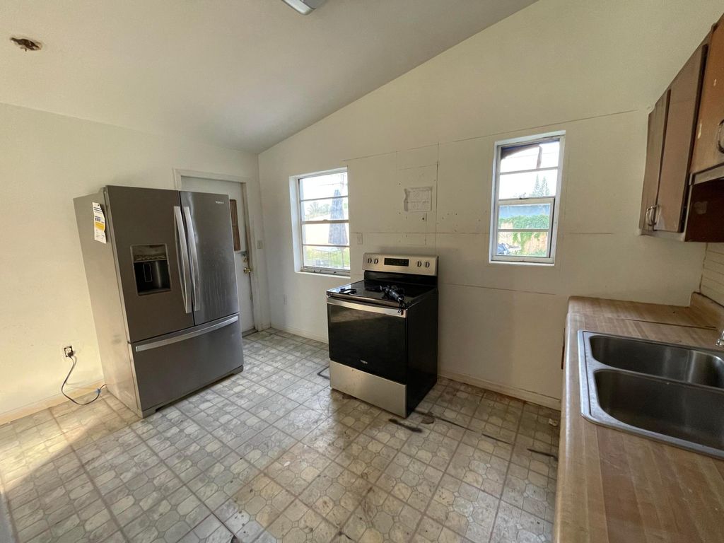 Photo of 440 Pensacola Drive, Lake Worth, FL 33462 (MLS # R11012250)