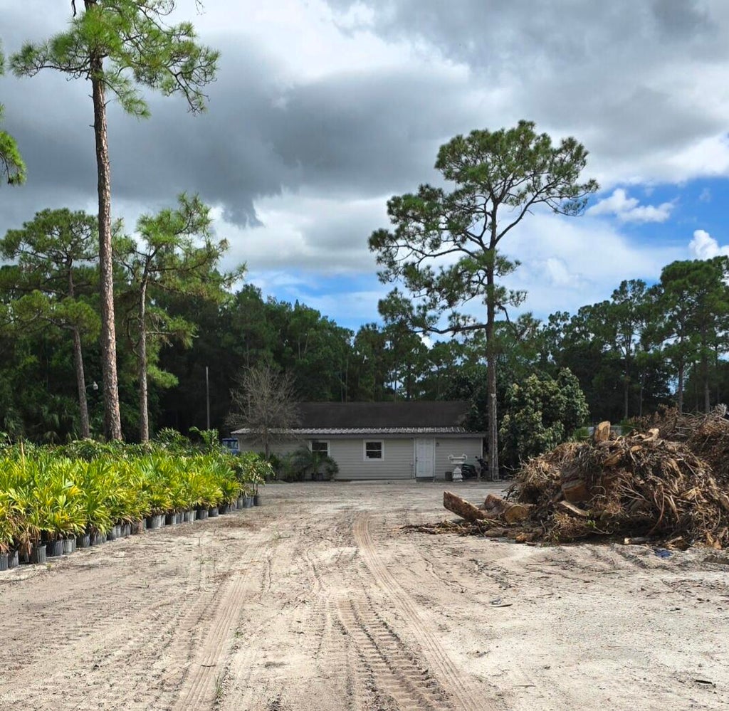 Photo of 15720 Okeechobee Boulevard, Loxahatchee Groves, FL 33470 (MLS # R11144262)