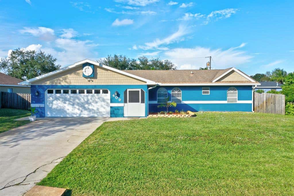 Photo of 409 SW Eyerly Avenue, Port Saint Lucie, FL 34983 (MLS # R10765947)