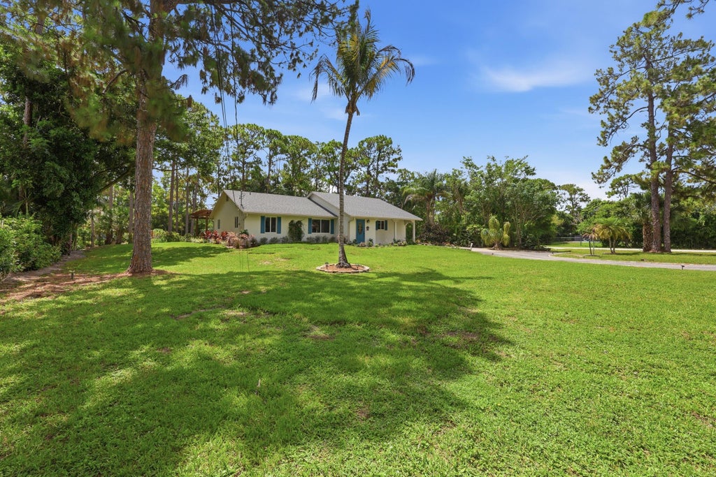Photo of 5750 Royal Palm Beach Boulevard, West Palm Beach, FL 33411 (MLS # B26045537)