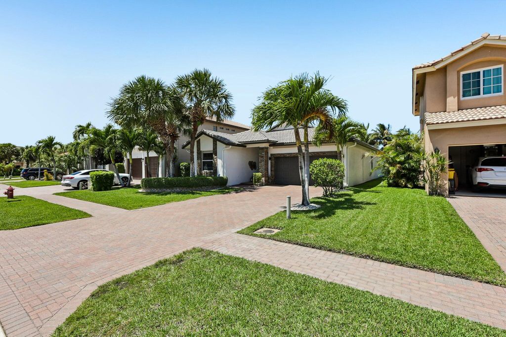 Photo of 121 Bellezza Terrace, Royal Palm Beach, FL 33411 (MLS # B26021027)