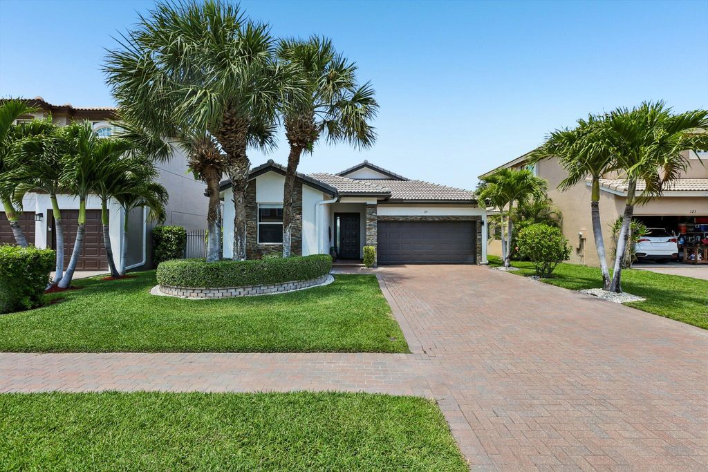 Photo of 121 Bellezza Terrace, Royal Palm Beach, FL 33411 (MLS # B26021027)