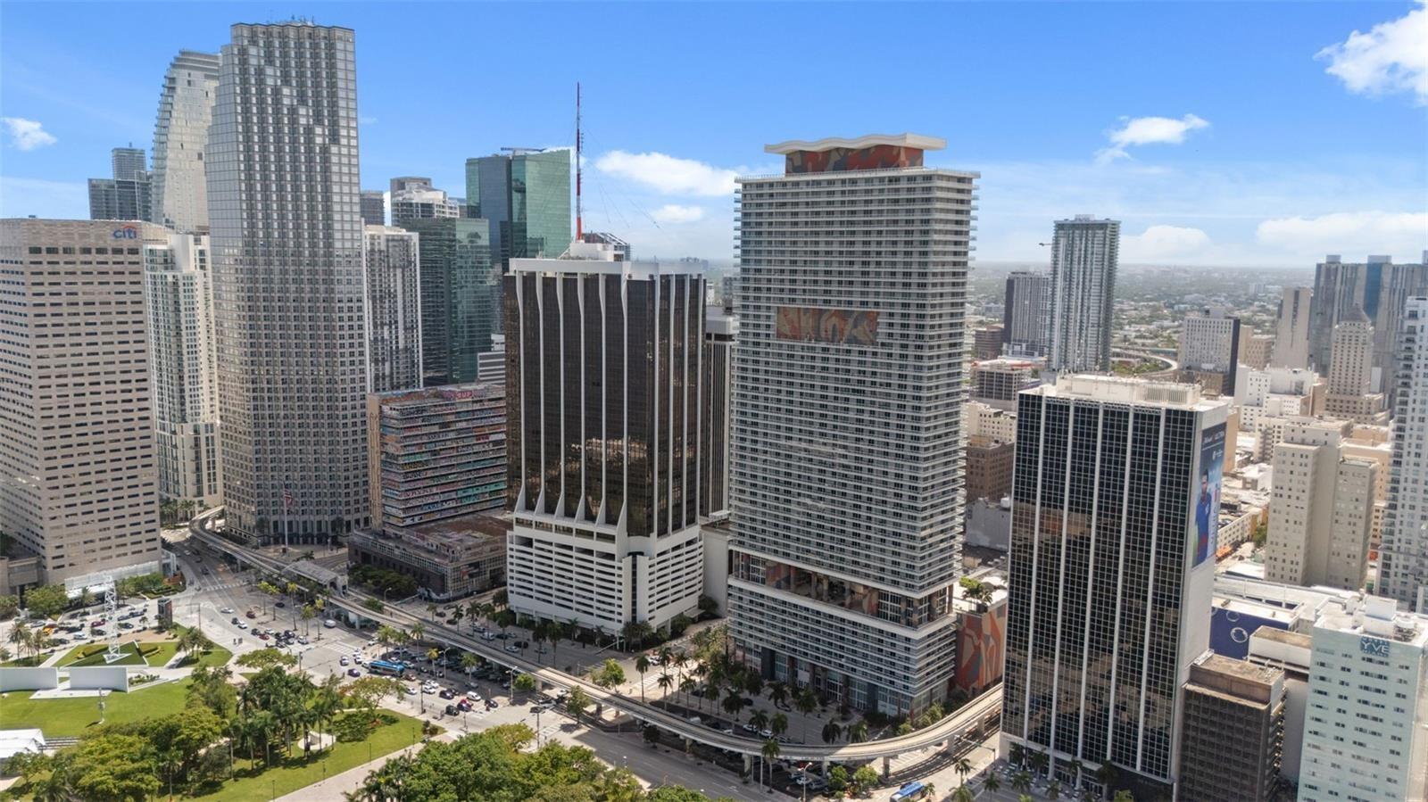 Discover an exceptional living experience in this stunning highrise condominium located at 50 Biscayne Blvd, Miami, FL. This beautifully appointed condo offers 1,322 square feet of living space, featuring two spacious bedrooms plus a converted den that is now a 3rd bedroom and two luxurious bathrooms, perfectly designed for modern comfort and style.Step inside to find a thoughtfully renovated kitchen and bath that exude contemporary elegance. The condo's eastern exposure allows for abundant natural light and jaw dropping bay views, creating a warm and inviting atmosphere throughout the home. Enjoy the serene environment provided by soundproof windows, ensuring a peaceful retreat amidst the vibrant city life.